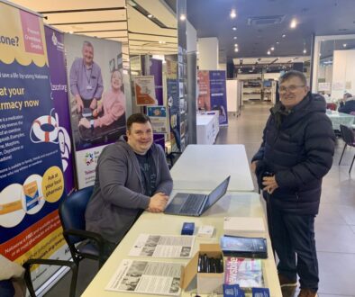 Lewis and John at the NETRALT stand in the Vaccination Hub, Bon Accord Centre, Aberdeen